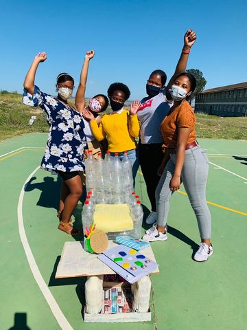 Learners celebrating with a project they built
