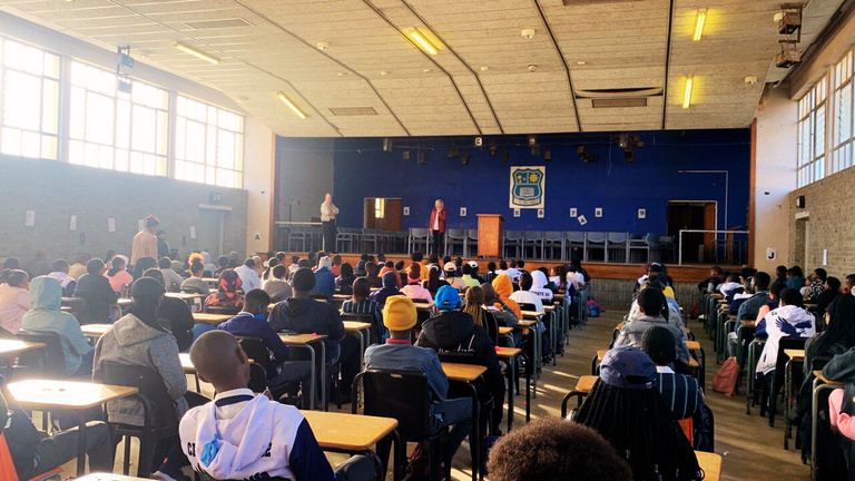 A school hall full of learners during a Kutitiva session